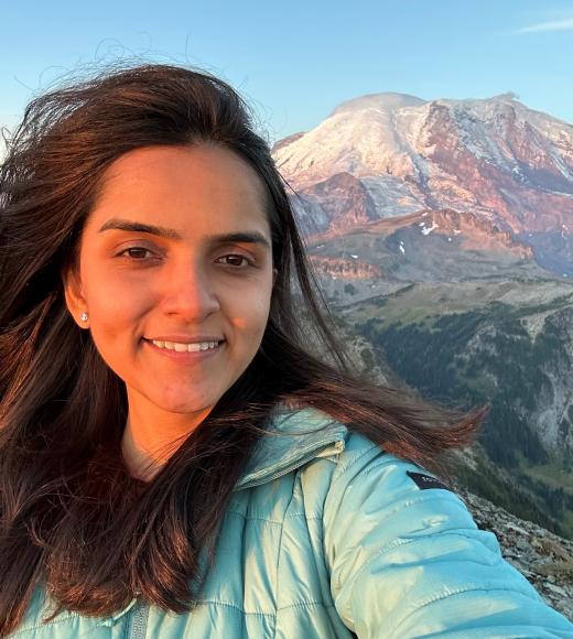 Arzoo in front of a mountain