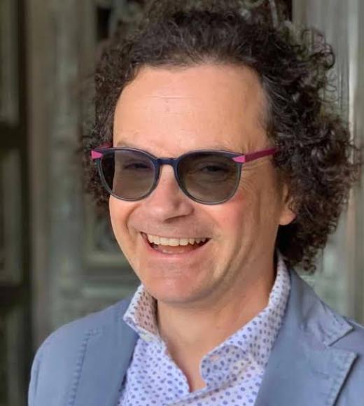 Man in sunglasses with pink accents