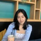 Woman sitting at a cafe