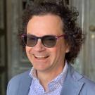 Man in sunglasses with pink accents